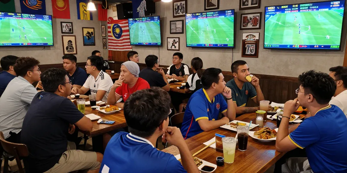 Football Betting Malaysia scene in a lively pub with fans discussing odds and watching matches.